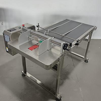 Paging feeder machine for large carton box